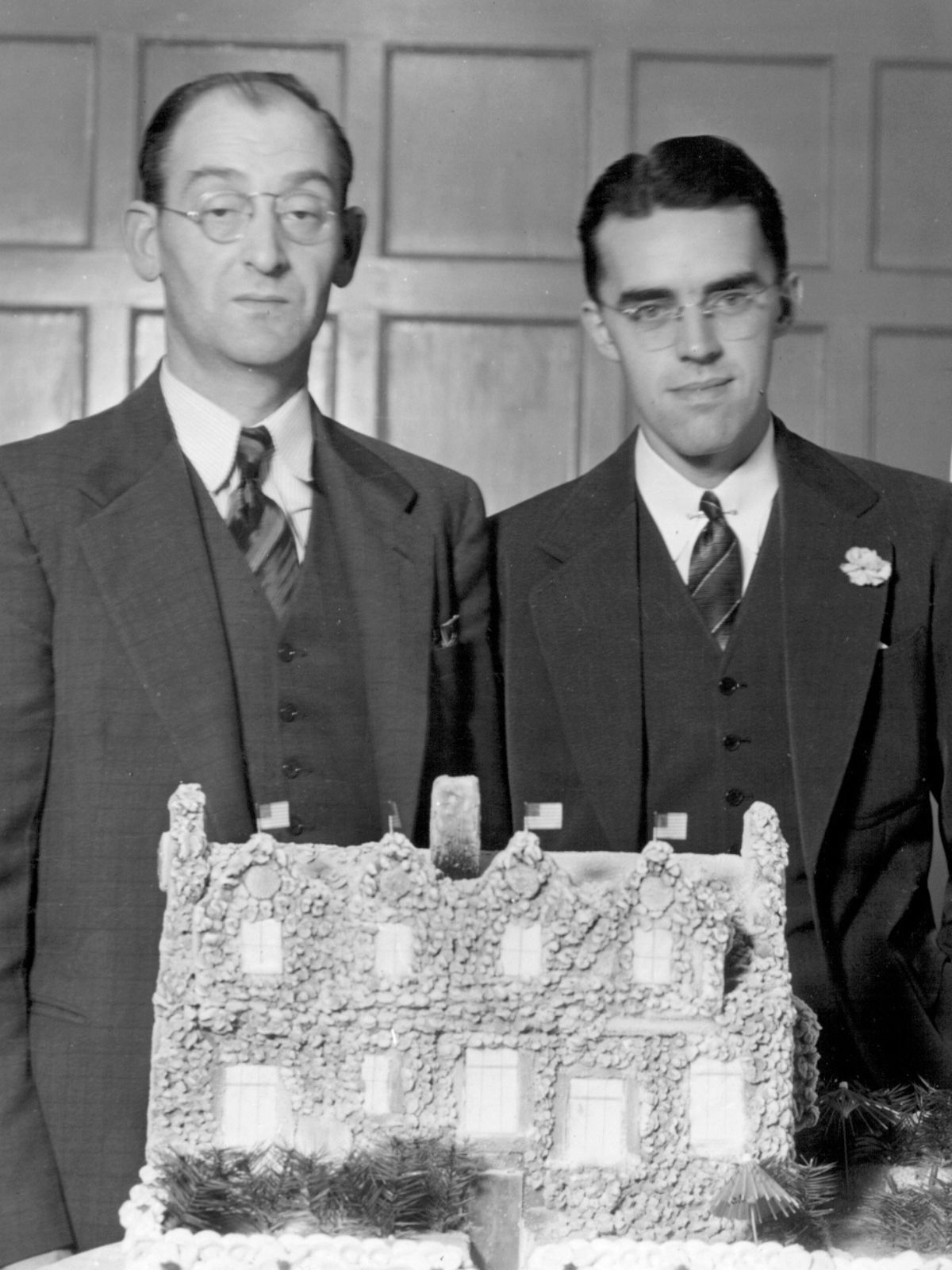 Members with a model of the clubhouse, from the Club's archives